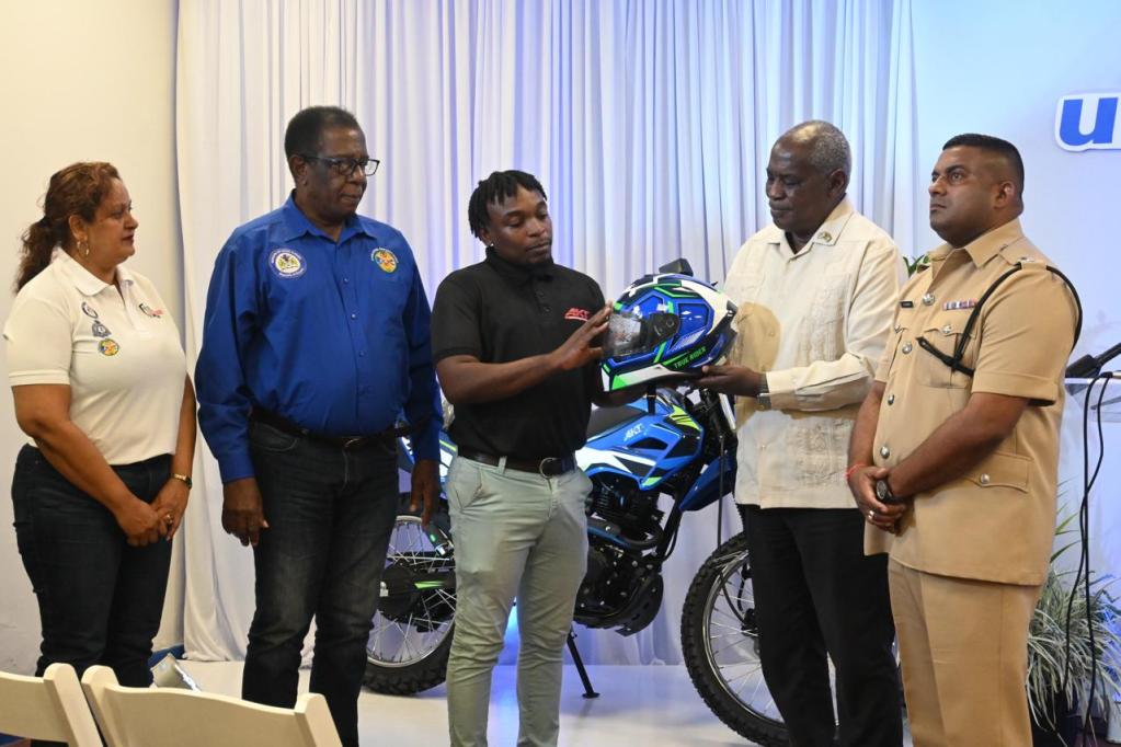 Courts gifts Police Force helmets, motorcycle to improve road safety