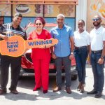 Massy Stores hands over keys for sleek SUV to lucky Christmas Jackpot winner