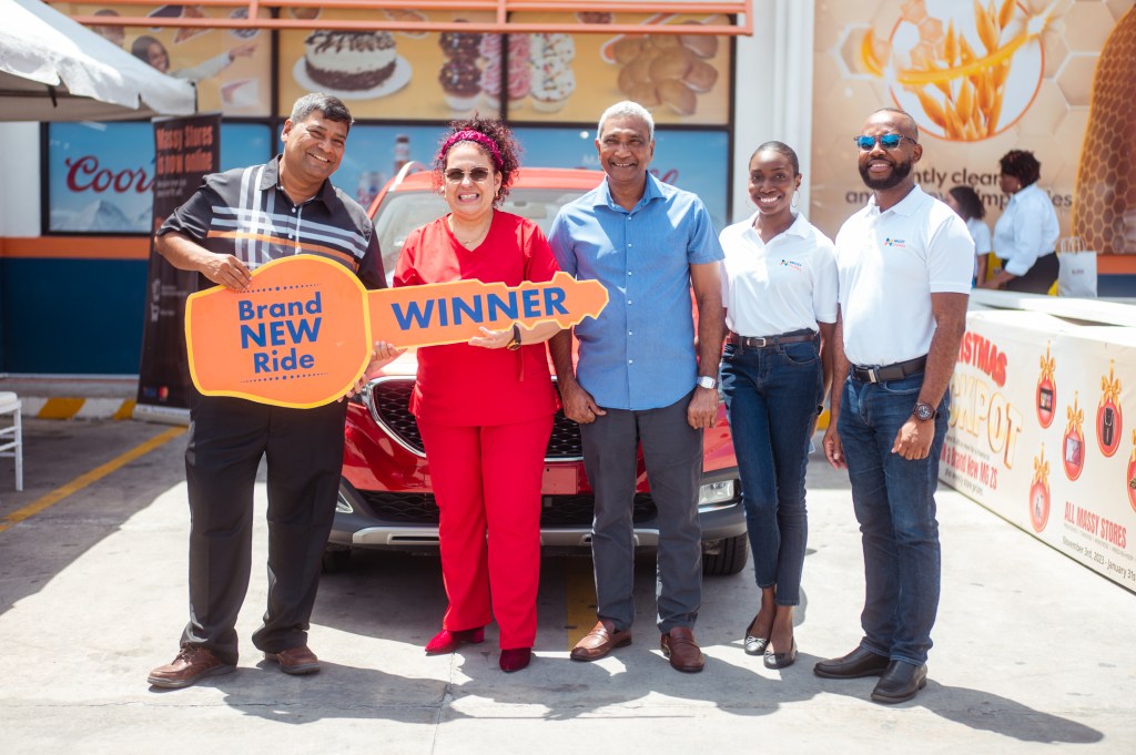 Massy Stores hands over keys for sleek SUV to lucky Christmas Jackpot winner