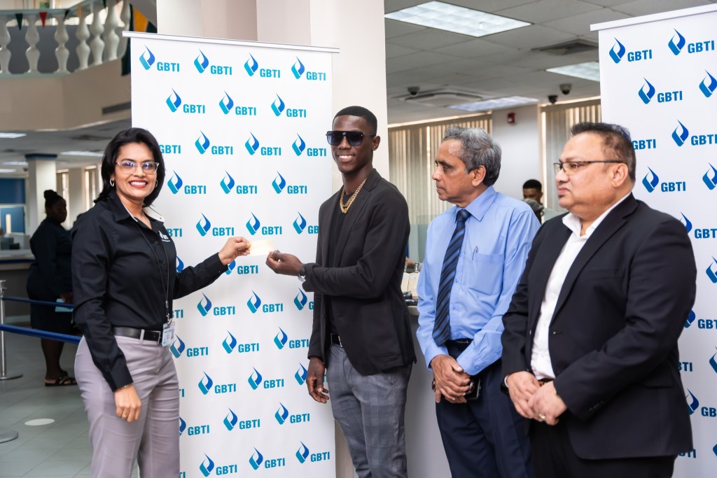 GBTI presents Gold Mastercard to cricket hero Shamar Joseph