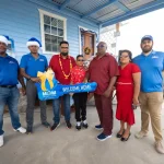 President Ali gifts Enterprise family new home for Christmas