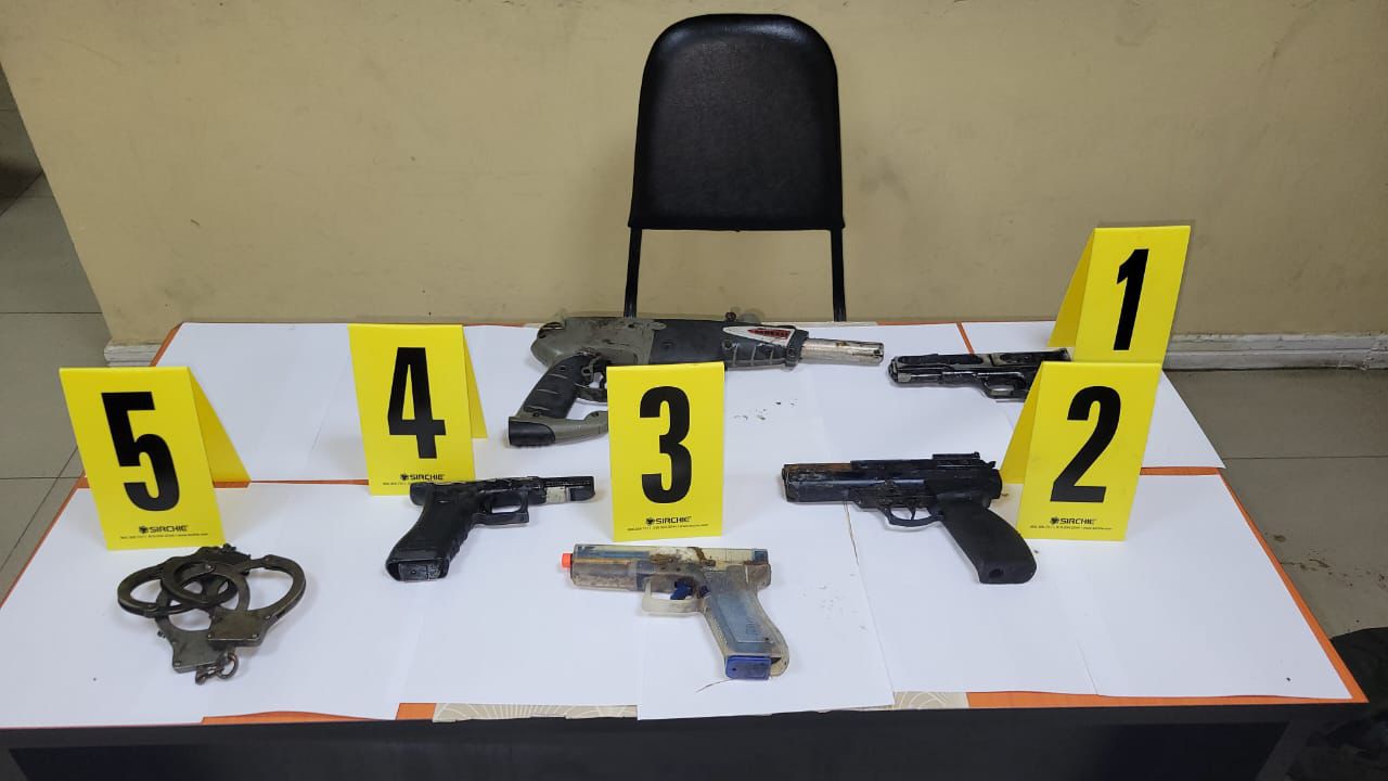 Police vest, handcuffs and pistols found at Garden of Eden
