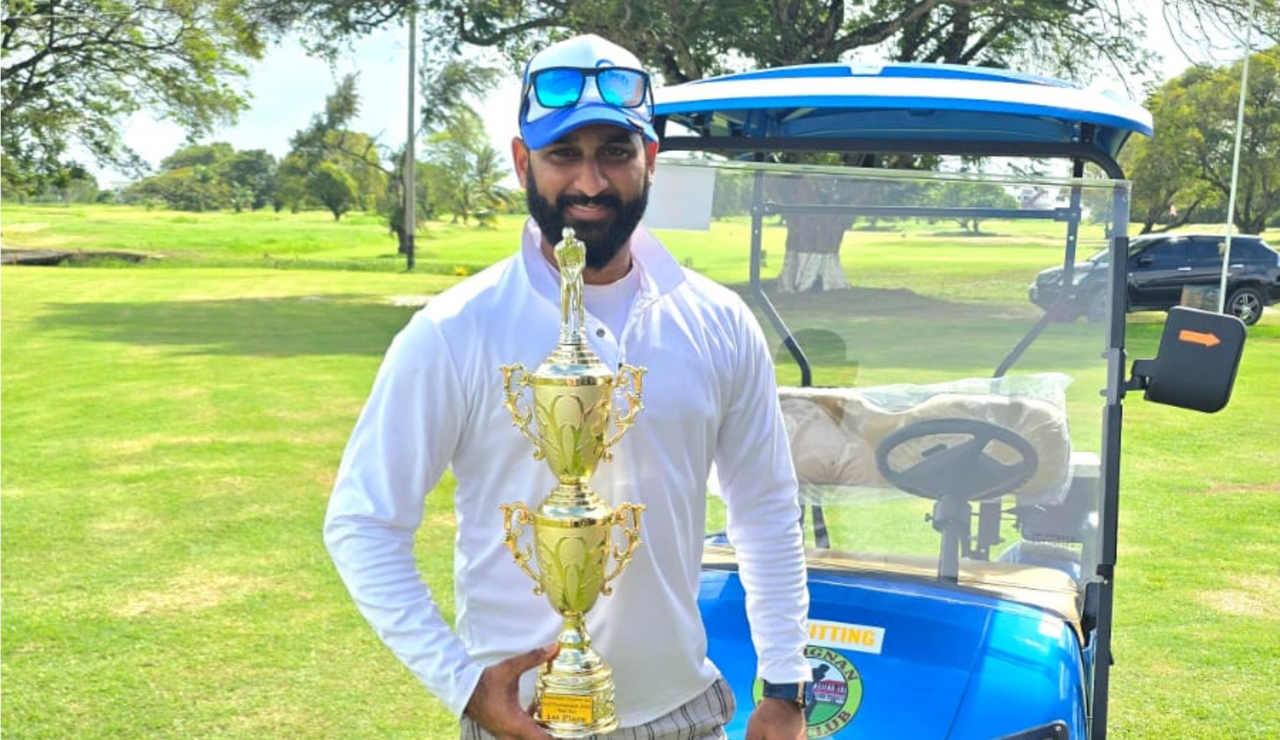 Anand Persaud tames wet conditions to storm into overall lead