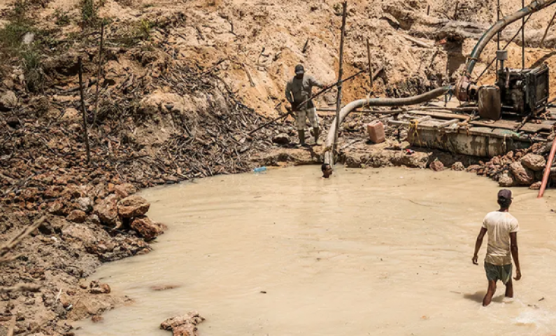 Two men trapped in collapsed mining pit 